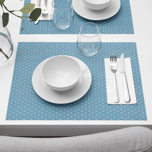 Add a touch of style to your dining table with our versatile plastic place mats from IKEA 40392727