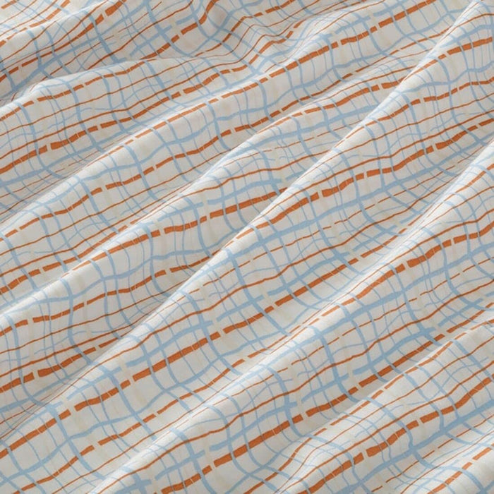 Close-up of orange and blue checkered cotton flat sheet from IKEA 905.075.42
