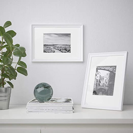 Elevate your photo display game with a stylish and affordable white 21x30cm photo frame from IKEA 20427285