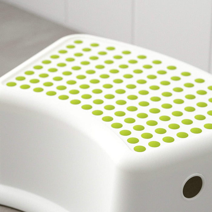 A close-up of the smooth surface of the IKEA children's stool, making it easy to clean and maintain  40248419