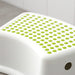 A close-up of the smooth surface of the IKEA children's stool, making it easy to clean and maintain  40248419