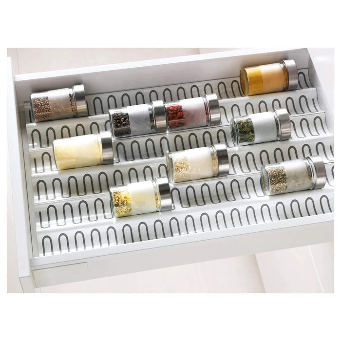 The IKEA Insert for Spice Jars is a simple and effective way to keep spices organized in the kitchen.