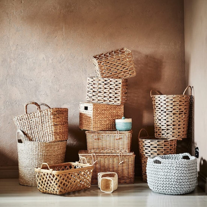 A set of small wire baskets, ideal for organizing kitchen utensils or pantry items.