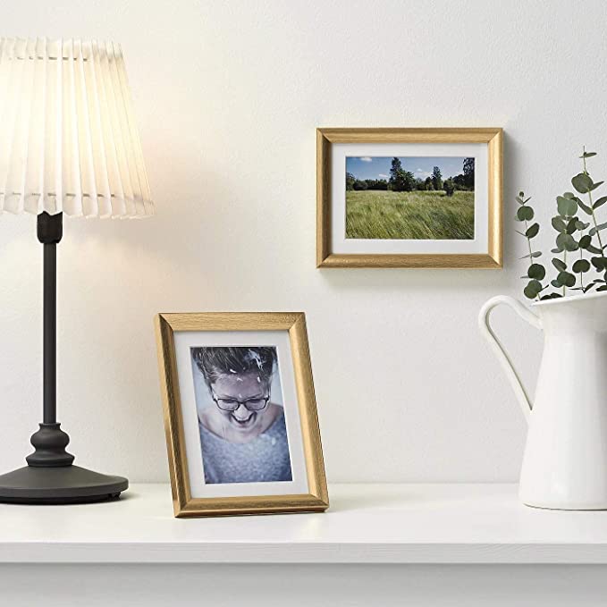 "This IKEA frame in gold color adds a touch of glamour to your wall display.00370398 