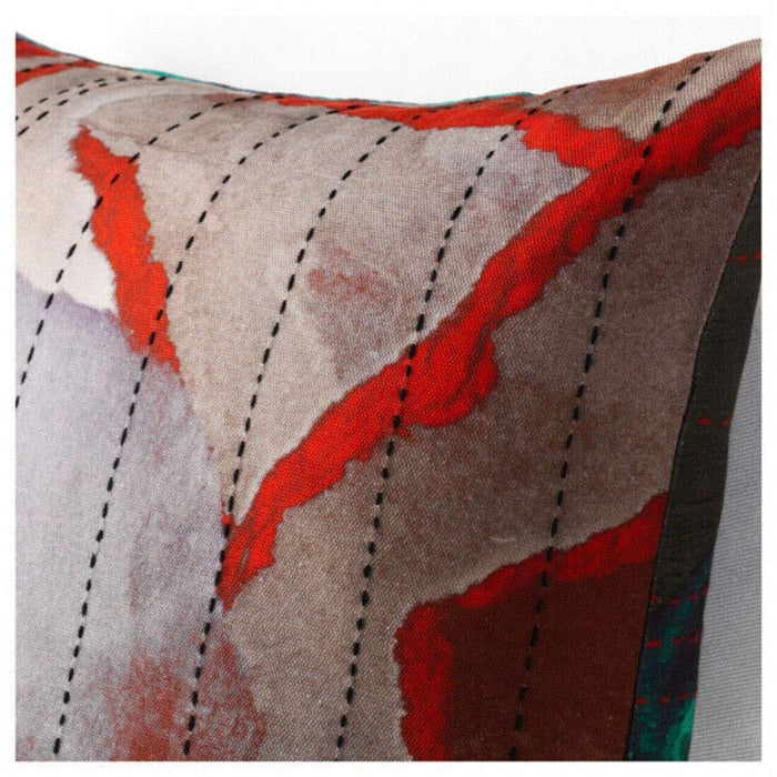 A close-up of an IKEA cushion cover in a textured green/red fabric, featuring a subtle pattern of light and dark woven threads80434396