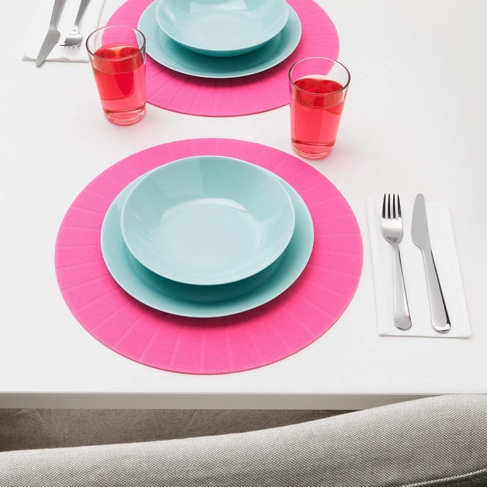  A pack of four vibrant placemats made of sturdy plastic, featuring an eye-catching pattern and a cheerful color palette 20408908