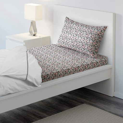 Multicolor cotton flat sheet and pillowcase from IKEA on a bed  30419015