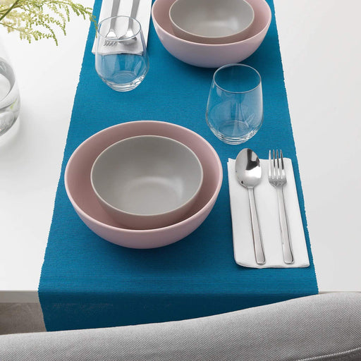 A long, narrow fabric strip that adds a touch of sophistication to your dining table 80432651