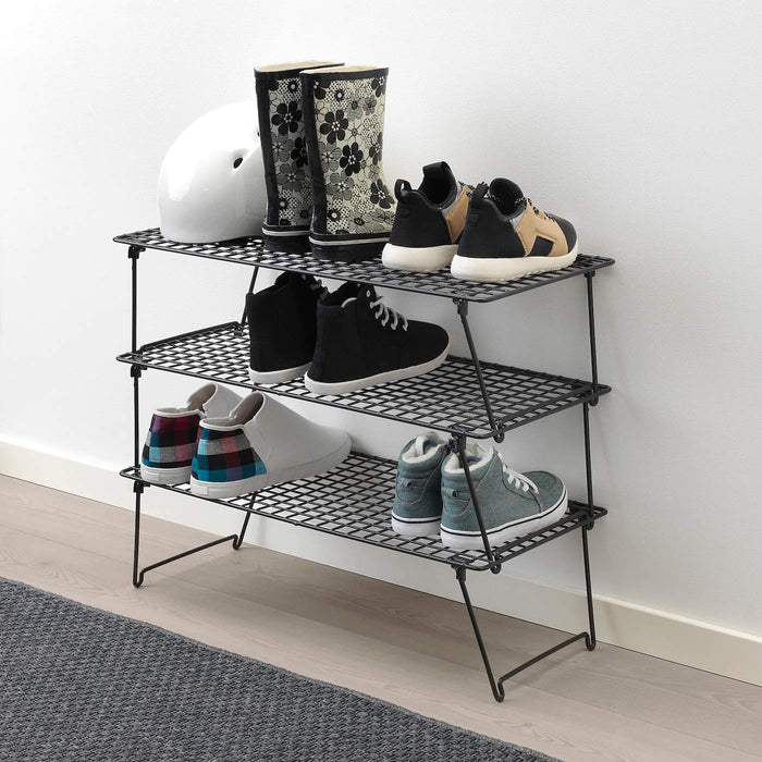  a photo showcasing neatly organized shoes on the rack, highlighting its functional purpose.  90329875