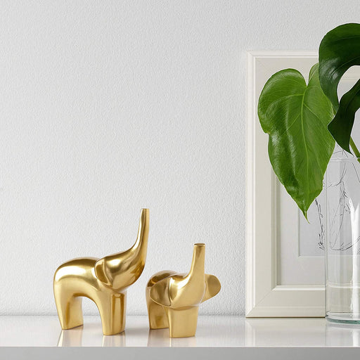 Adorable elephant designs in shiny gold finish on IKEA's Elephant Decoration Set of 2 50477085