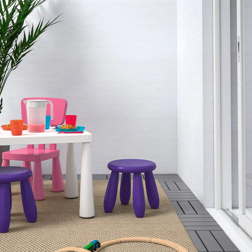 IKEA children's stools in various colors, perfect for adding a pop of color to any kids' room.