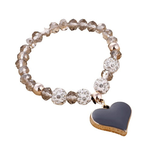 A close-up of a trendy, Women Heart Pendant Bracelets Bling Crystal Beads Charming Bracelets Jewelry