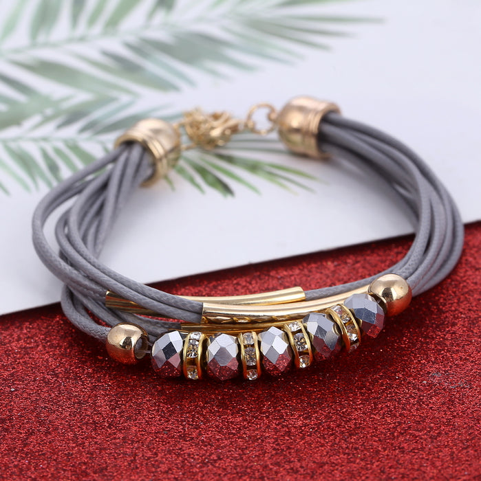A multilayer leather bracelet with a rustic, earthy feel