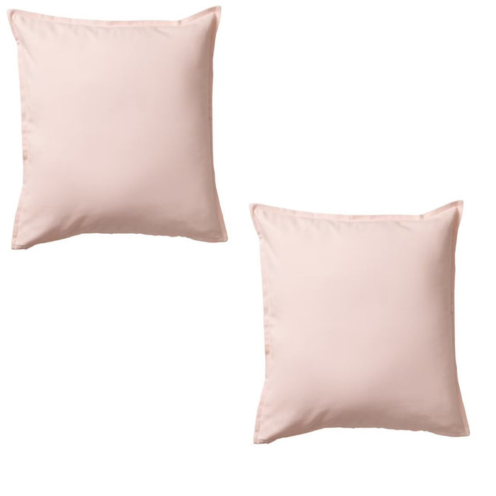 A simple yet elegant cushion cover in solid light pink, crafted from durable and easy-to-clean materi-00343630