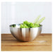Digital Shoppy IKEA Serving Bowl, Stainless Steel, 20 cm, A minimalist stainless steel serving bowl from IKEA, 20 cm in size, sitting on a black countertop with a wooden spoon resting inside it.