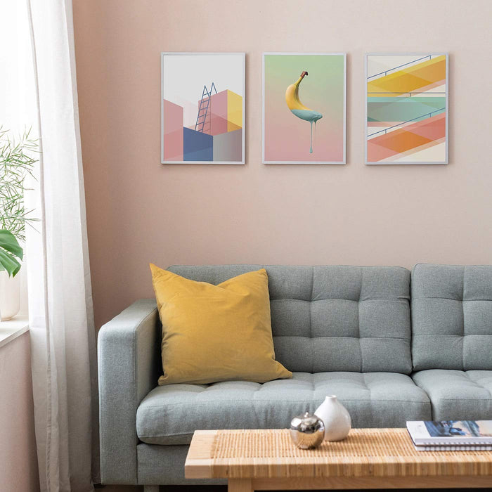An image of the posters from IKEA's 3 pack set, arranged in a stylish and modern gallery wall  50448187