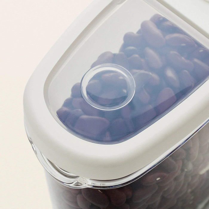 Small, clear plastic dry food jar with a pink lid and a snap-lock closure-Digital Shoppy