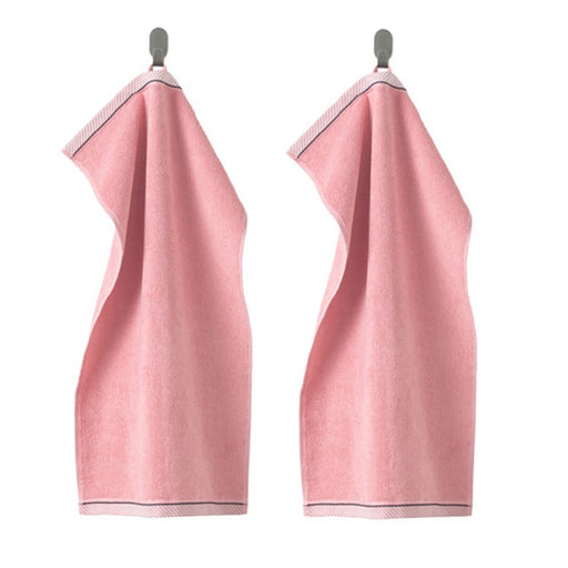 A pink hand towel with a soft, smooth texture10405236
