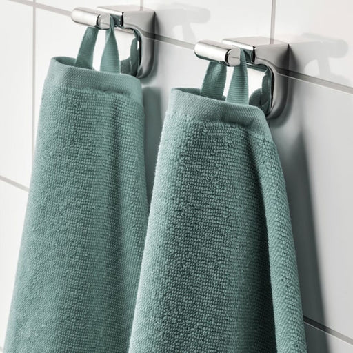 A Grey-Turquoise Ikea hand towel with fringed edges hanging on a hook 30488042