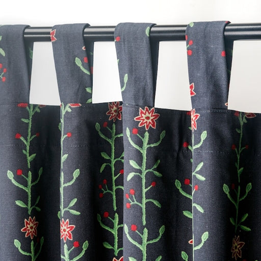 The curtains are made from a blend of polyester and cotton, making them durable and easy to maintain.