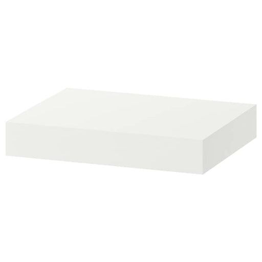 Create a sleek, minimalist look with a white Lack wall shelf from IKEA.