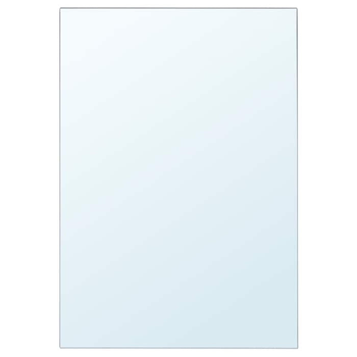 This IKEA mirror features a sleek white frame and can be hung horizontally or vertically to fit any room layout 90300457