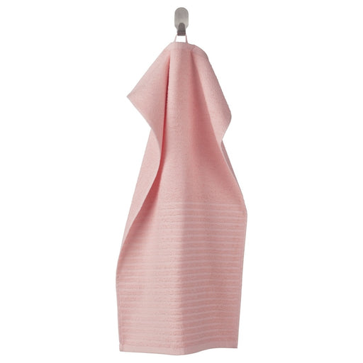A pink hand towel with a soft, smooth texture70488016