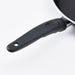 "A close-up of the IKEA frying pan, with a non-stick surface and a black handle"