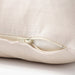 An image of an IKEA cushion cover with a light beige color showcasing its soft texture and hidden zipper-  80511672.
