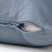 An image of an IKEA cushion cover with a Gray-Blue color showcasing its soft texture and hidden zipper-90492630