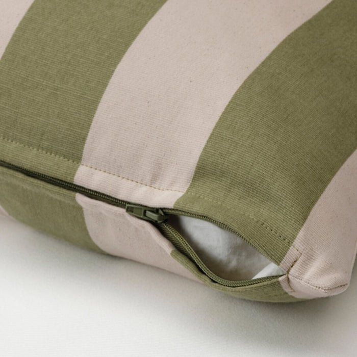 An image of an IKEA cushion cover with a green color showcasing its soft texture and hidden zipper- 70495272