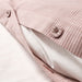  A closeup image of the Cozy Pink Duvet Cover and Pillowcase Decorative buttons keeps the duvet in place  90423236