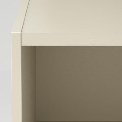 Digital Shoppy IKEA's GURSKEN bedside table in light beige, shown in a bedroom setting with a lamp and books on top. 90503290 
