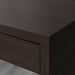 Close-up of the black-brown IKEA desk surface, showing its texture and color20354279