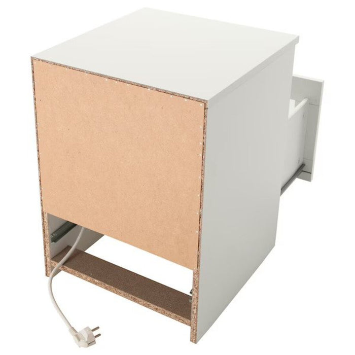  IKEA bedside table with USB charging ports for convenient device charging.00354063