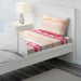 Pink Cotton flat sheet and pillowcase from IKEA on a bed 90455166