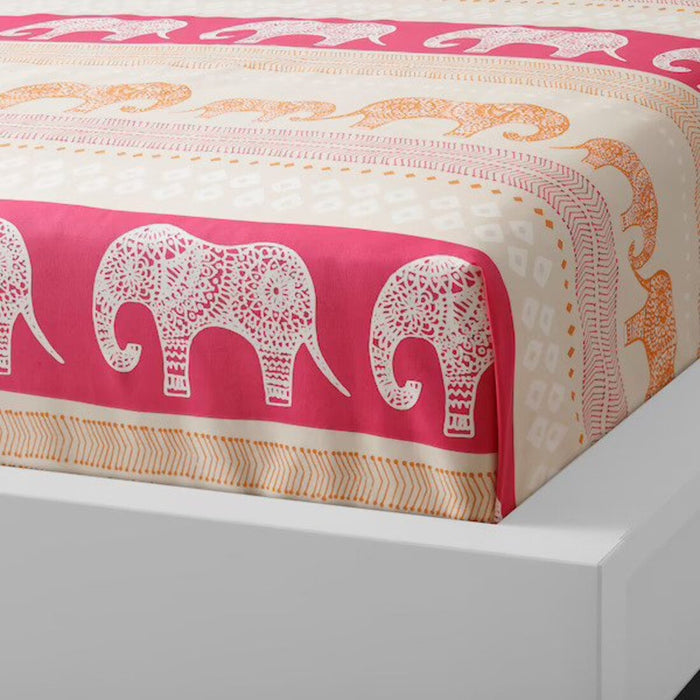 Pink cotton flat sheet and pillowcase from IKEA draped on a bed   90455166