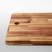 A functional bamboo chopping board from IKEA, with a non-slip surface for safety during food prep.