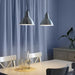 A modern pendant lamp hanging from the ceiling in a stylish living room 40423385