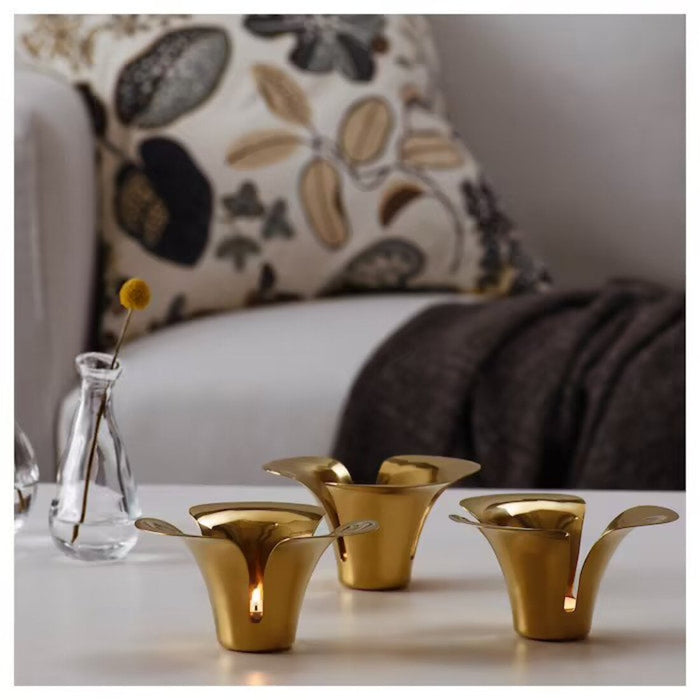 This charming tealight holder from IKEA will make a lovely addition to your home. Its delicate design and soft glow will create a warm and welcoming ambiance 10510973
