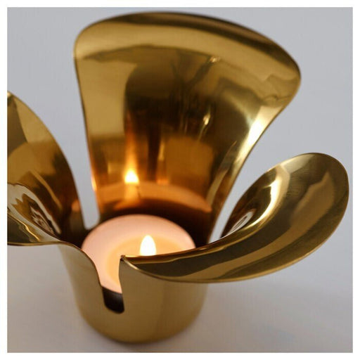 Create a cozy atmosphere with this elegant tealight holder from IKEA. Its sleek and minimalist design will make it a perfect addition to any déco 10510973