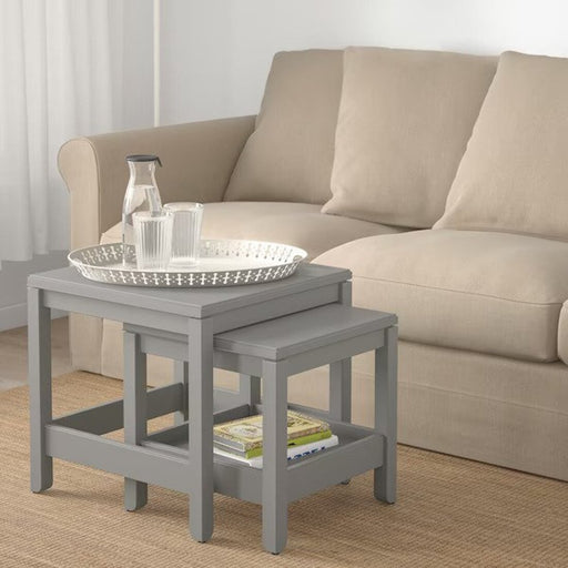 A versatile set of tables that can be used in any room of the house, from the living room to the bedroom or home office.