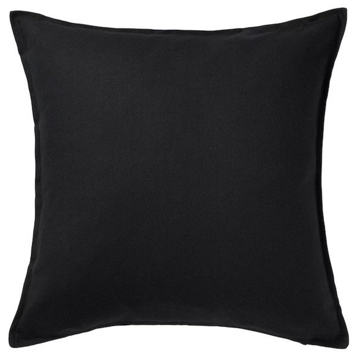 A simple yet elegant cushion cover in solid black, crafted from durable and easy-to-clean material-60281139