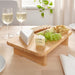 An IKEA cutting board set consisting of three boards in different sizes and colors, made of flexible and easy-to-clean material, perfect for organizing your kitchen.