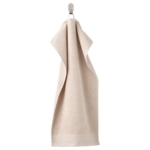 A Light grey/beige hand towel with a soft, smooth texture 60508326 