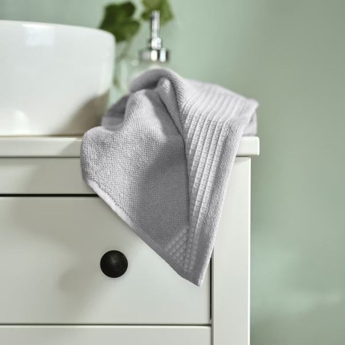 A fluffy white bath towel from IKEA, measuring 70x140 cm and crafted from high-quality cotton fibers.40521215, 40508332, 20521216 