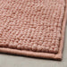 Thick and luxurious pink bath mat from IKEA, with a plush texture that provides comfort and warmth to your feet after a shower or bath 90517027