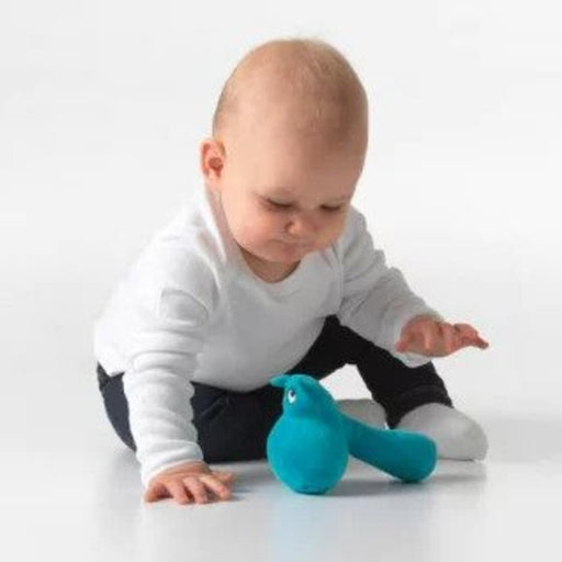 A baby boy is playing with IKEA rattle 10422740