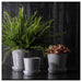A tapered plant pot with a rustic appearance. 00508433