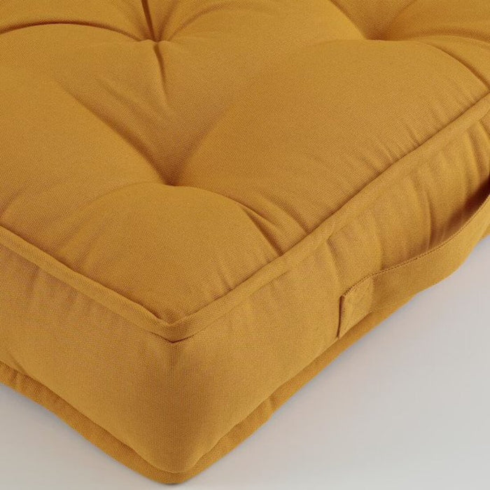 A soft, plush IKEA floor cushion in a pastel yellow shade. 00415844, 90540221,10540220, 70540222